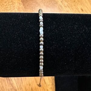 Handmade Seed Beaded Bracelet, with gold and cream colored beads. Dainty